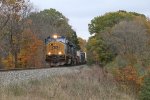 With the dynamic brakes howling, Q327 coasts down Saugatuck Hill